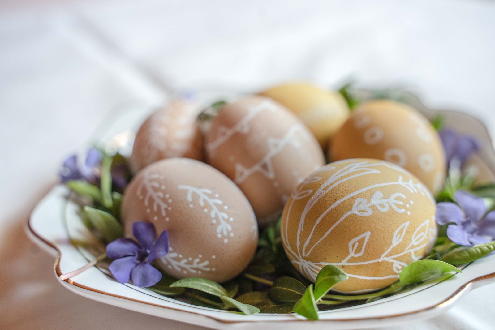 brown egg on white ceramic plate